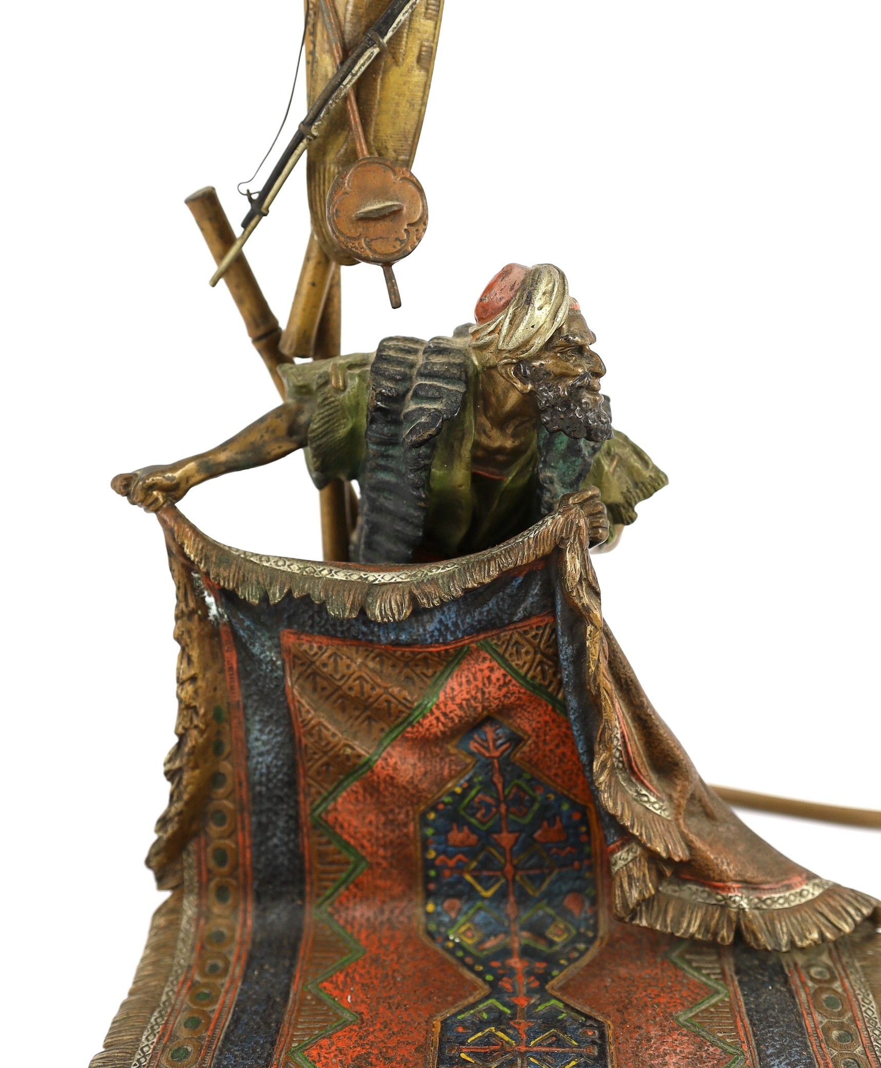 Franz Bergman (Austrian, 1861-1936). A cold painted bronze table lamp 'The Carpet Seller', 51cm high
